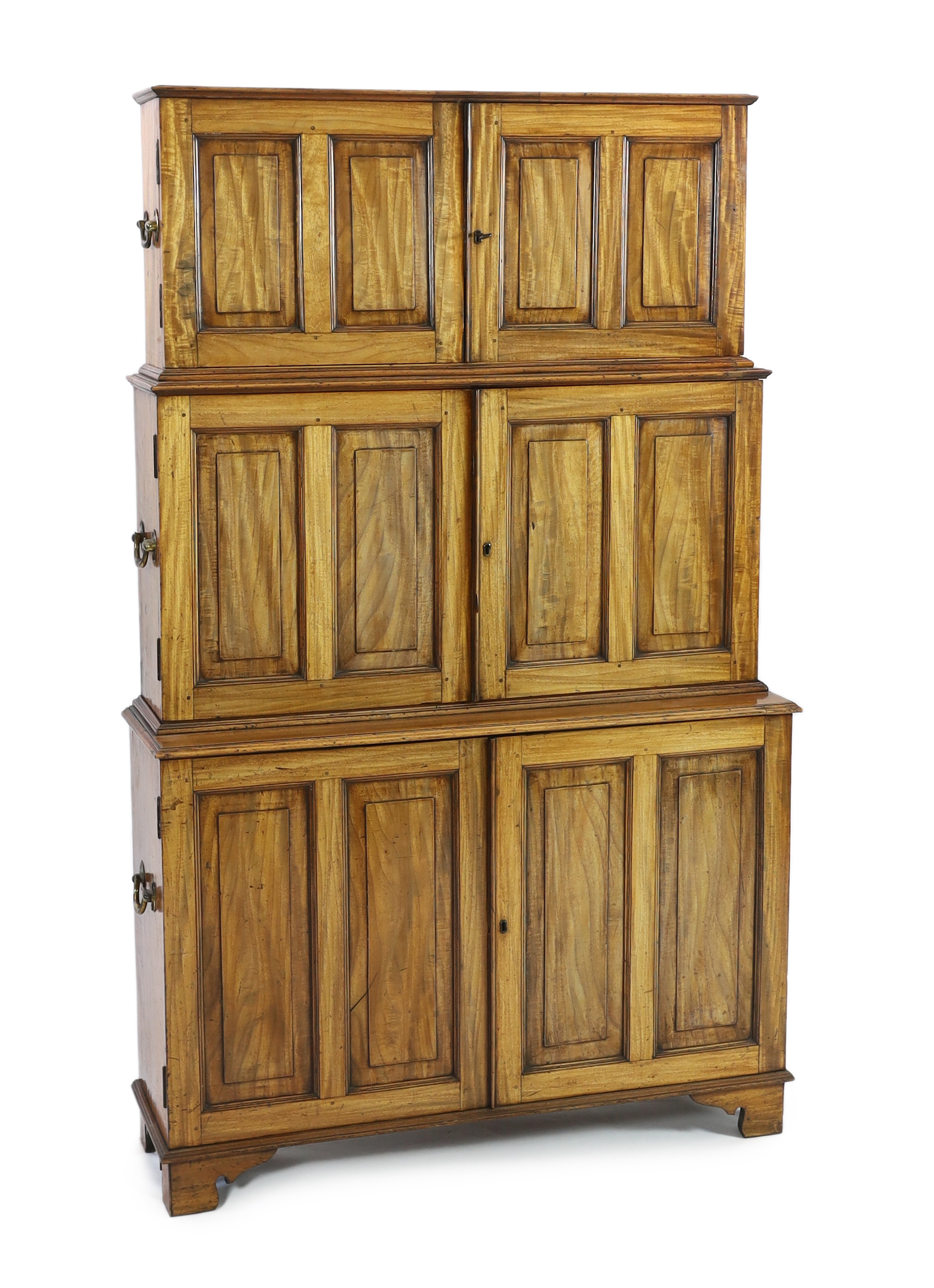 An unusual mid 19th century satinwood campaign bookcase, width 110cm, depth 34cm, height 177cm
